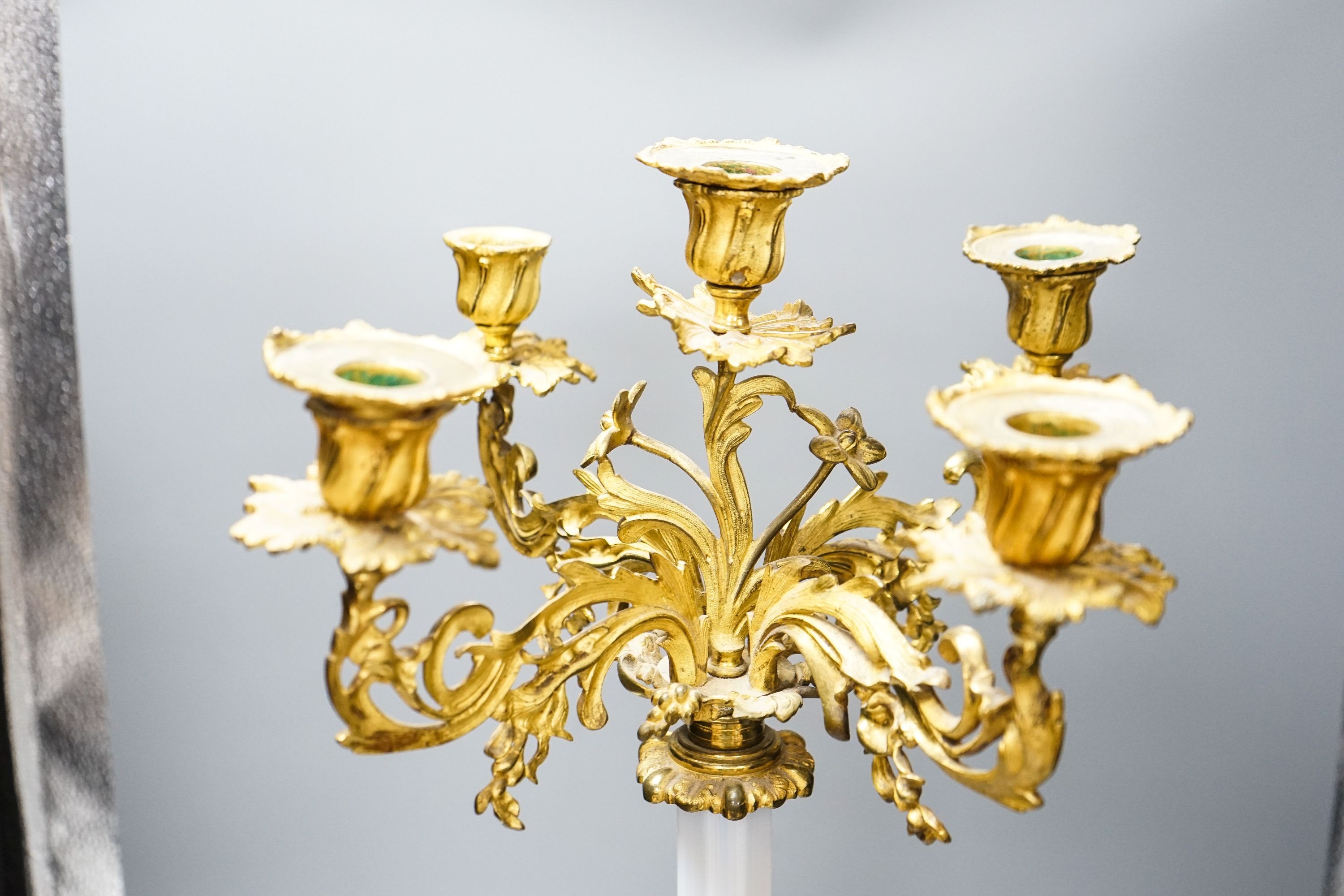 A 19th century ormolu and opaline glass five light candelabrum 63cm